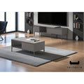 Grey coffee table in front of a matching TV console