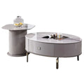 Grey oval coffee table with drawer and round pedestal side table