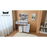 Pale dressing table with rounded rectangular mirror and storage drawers