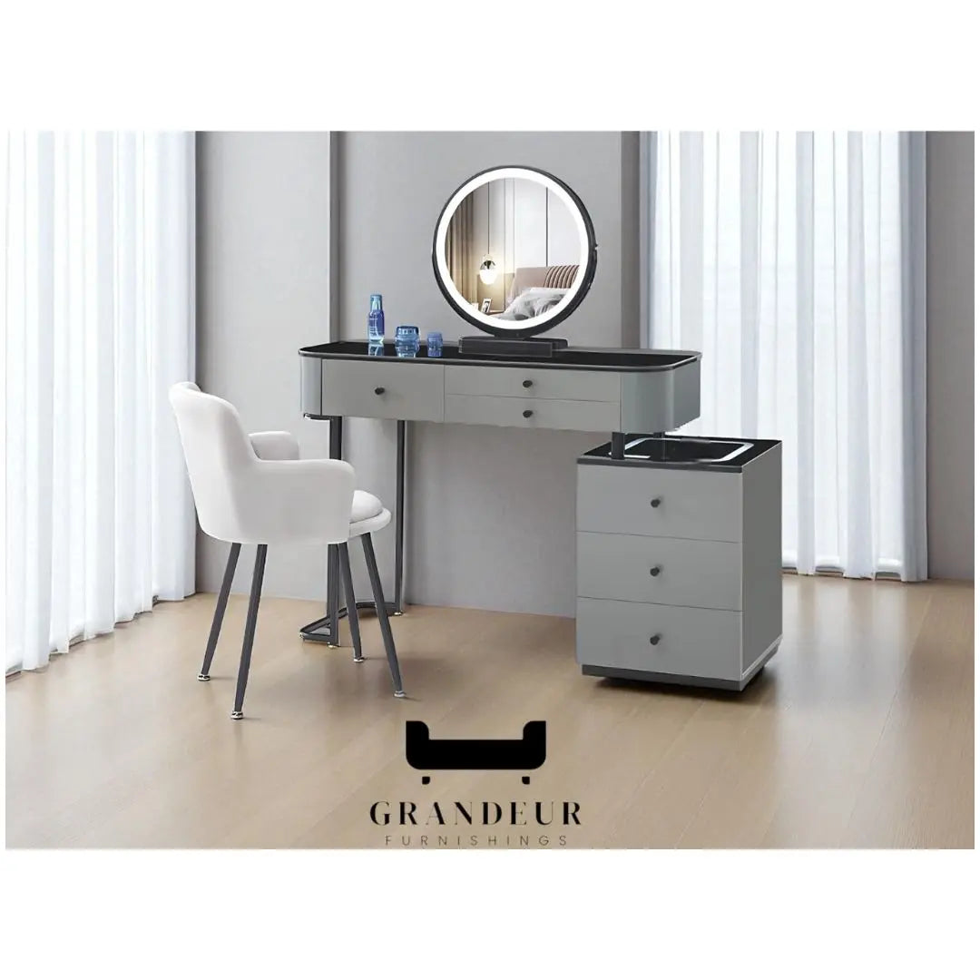 Grey dressing table with illuminated round mirror and separate drawer unit