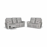 Grey Cove reclining sofa set with one footrest extended