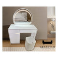 White dressing table with arched mirror, front view in a bedroom