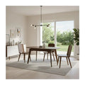 Wood dining table and chairs in a bright dining room