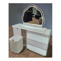 White dressing table with cloud-shaped mirror, angled view