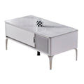 Pale rectangular coffee table with stone-patterned top and slim legs