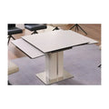 Pale pedestal dining table with side extension leaf open