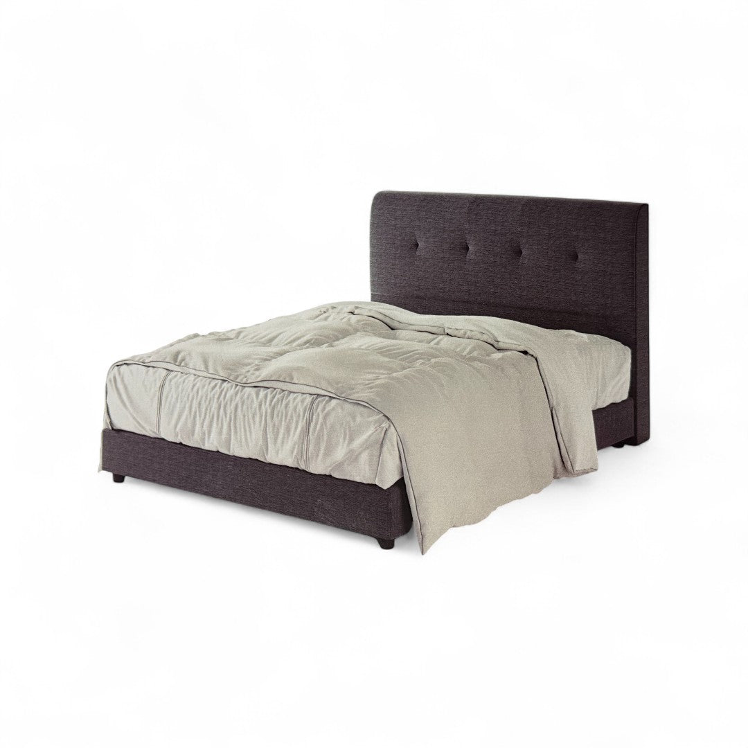 Minimalist upholstered bed with padded button-tufted headboard