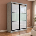 Marlow grey sliding wardrobe in a bedroom with warm pink walls