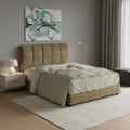 Brown panelled bed with light bedding in a bedroom