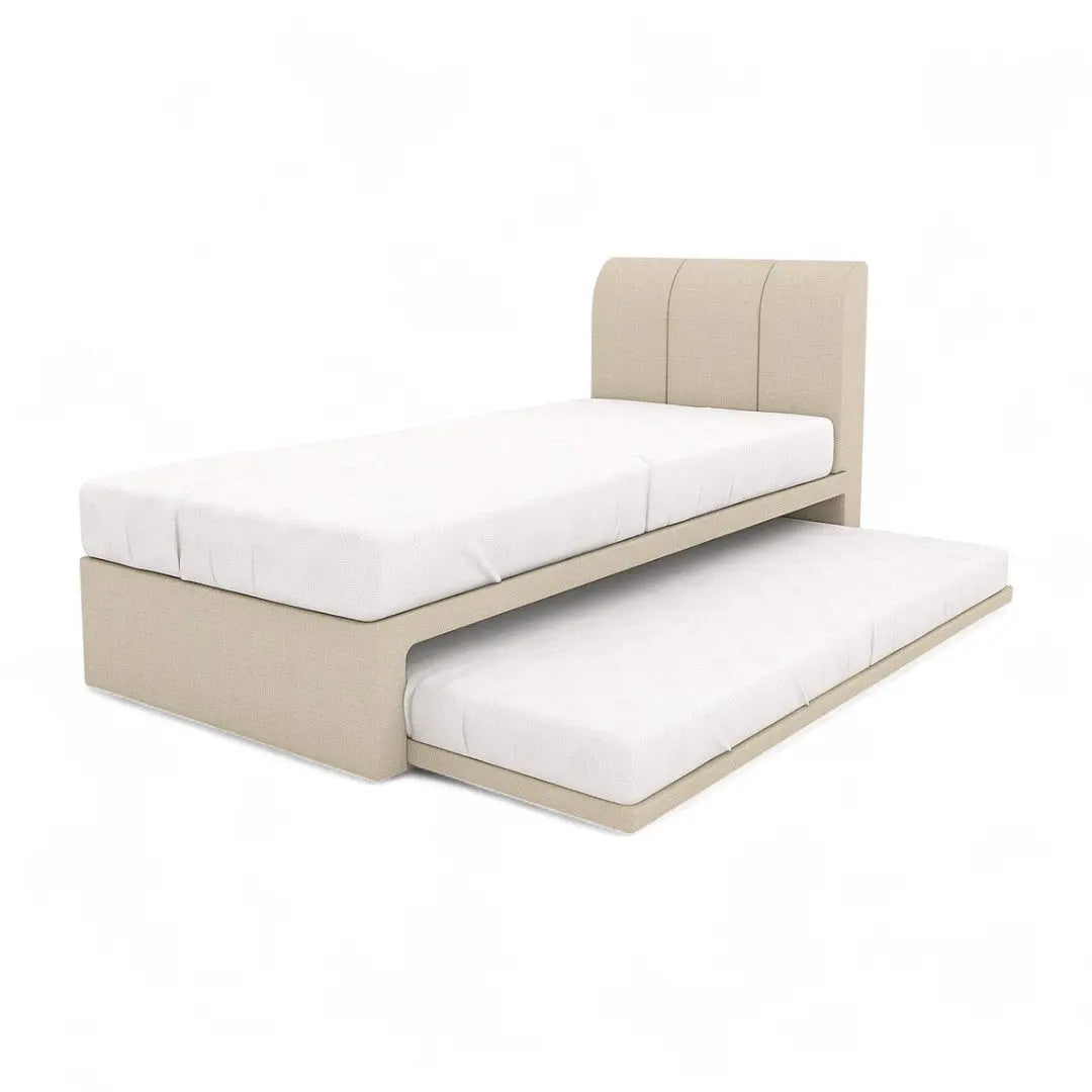 Cream Vantara guest bed with vertical-channel headboard and lower trundle