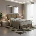 Brown upholstered bed with vertical headboard panels in a bedroom