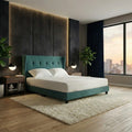 Teal Astria bed against a dark feature wall