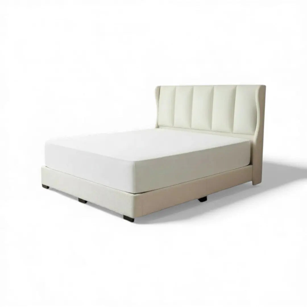 Cream Mirage upholstered bed with padded wingback headboard