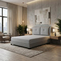 Grey Selaro bed with padded headboard in a bedroom