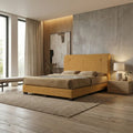 Ochre Restino bed beside a window