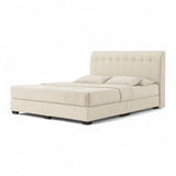 Cream Valenx upholstered bed with tall tufted headboard