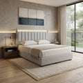 Grey Vessa bed with illuminated headboard beside a window