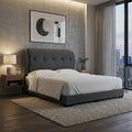 Dark grey Trivian bed in a softly lit bedroom