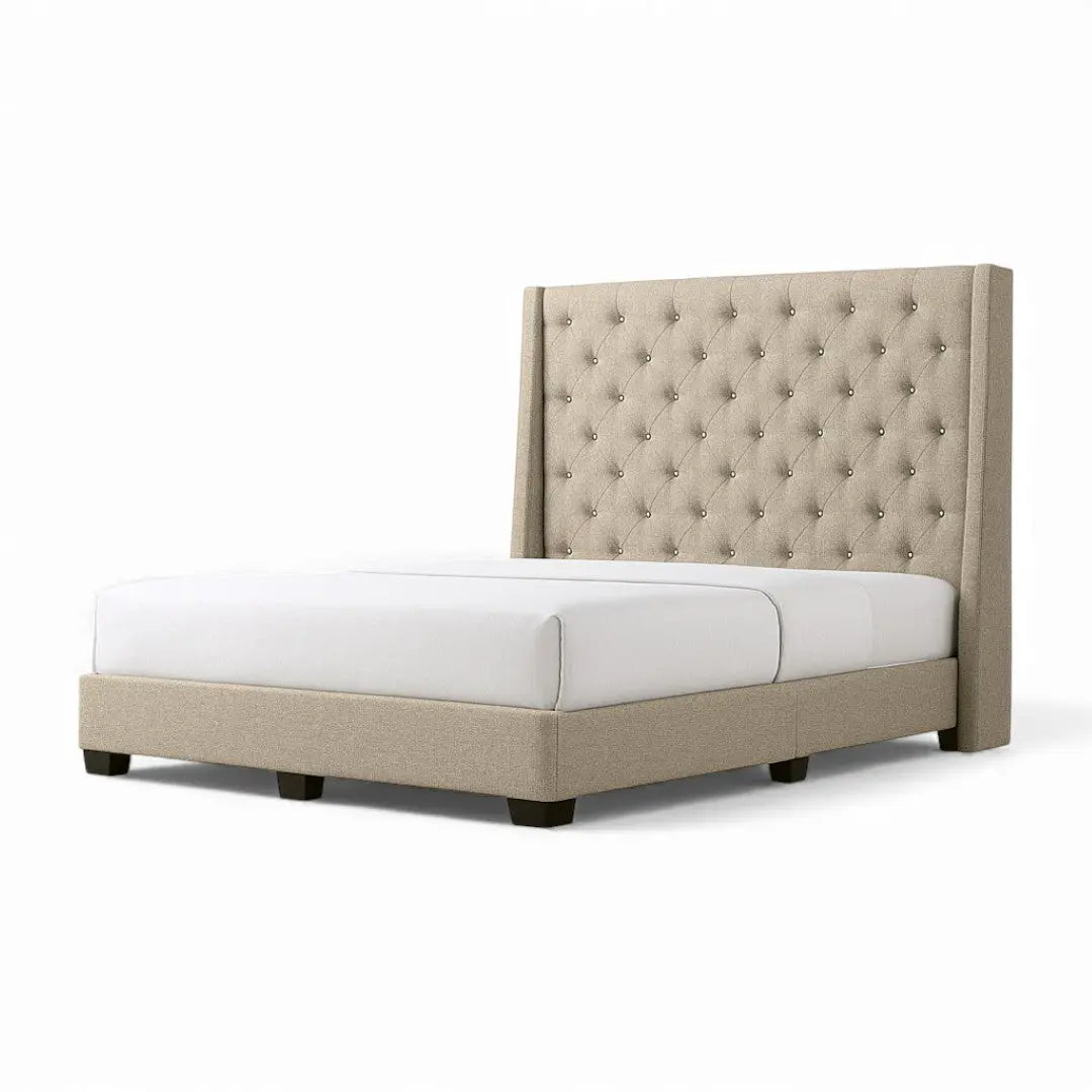 Beige Aurette bed with tall diamond-tufted wingback headboard