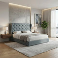 Blue-grey Monarque wingback bed in a bright bedroom