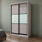 Alden grey sliding wardrobe in a bedroom with sage-green walls