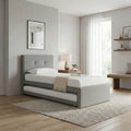 Grey Monti guest bed with trundle extended in a bedroom