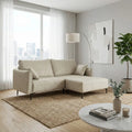 Cream Valentina sofa and ottoman beside a bright window